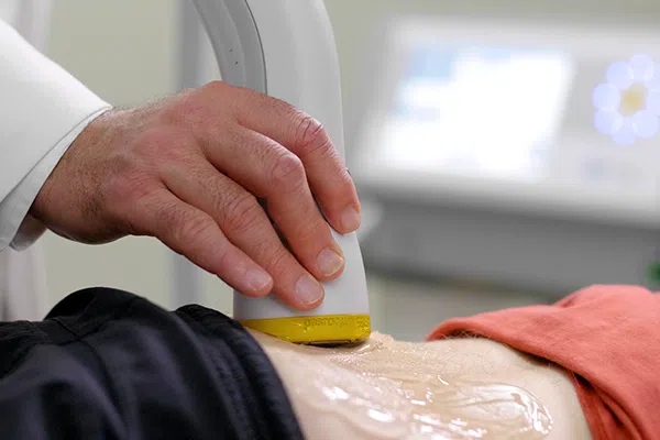 Learn more about SoftWave Therapy for back pain.