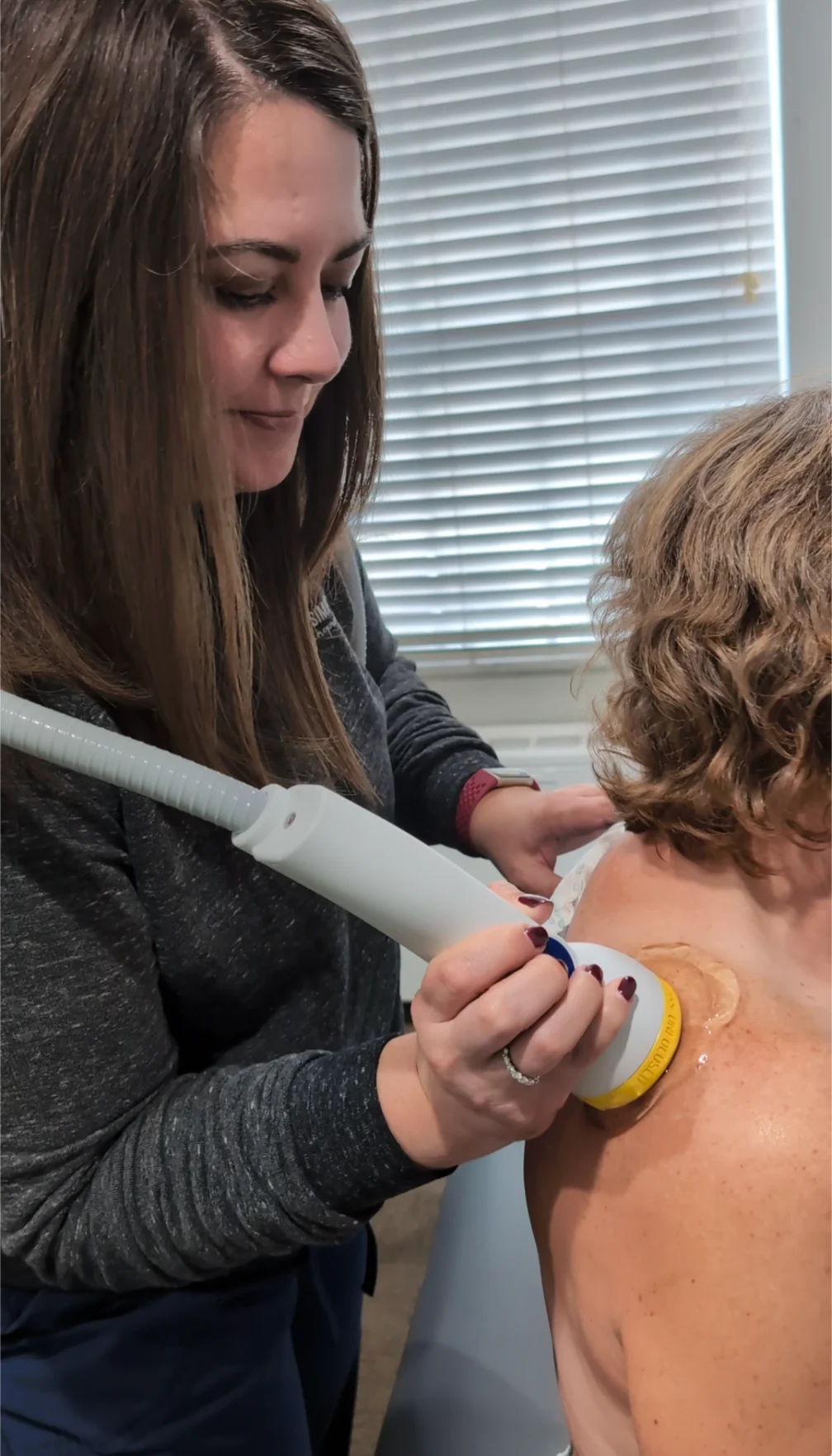 Woman receiving Softwave Therapy appointment in Cincinnati.